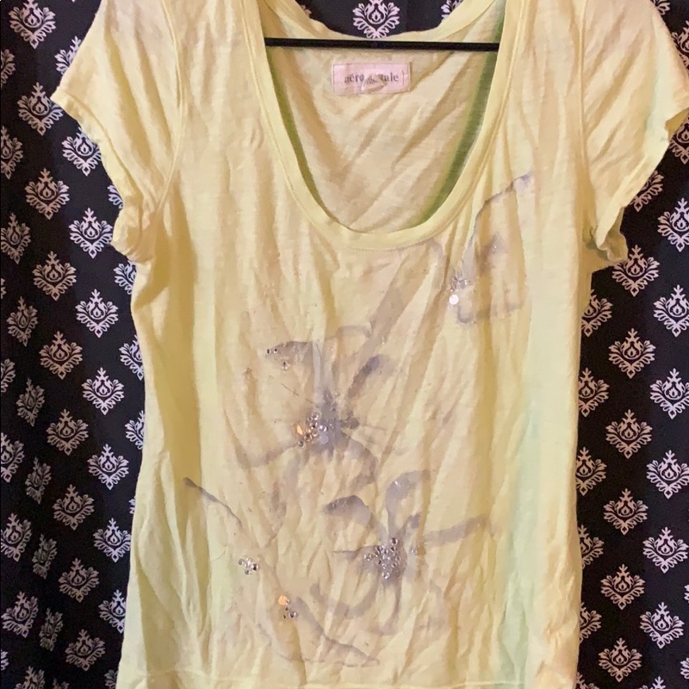 Yellow tee.